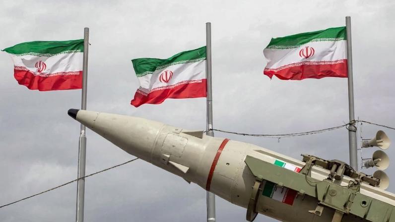 Missiles produced by Iran's armed forces are displayed near a row of Iranian flags during commemorations to mark the anniversary of the 1979 Iranian Revolution on Feb. 11 in Tehran.