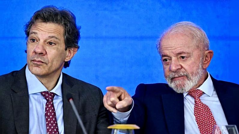 O ministro da Fazenda, Fernando Haddad, e o presidente Lula. Foto: Evaristo Sá/AFP