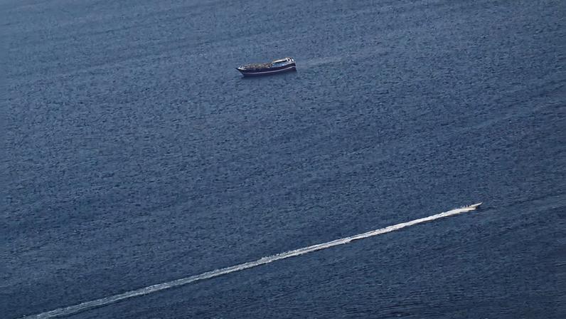 Boats in the Strait of Hormuz amid the U.S.-Israeli conflict with Iran, as seen from Musandam, Oman, March 2, 2026.REUTERS/Amr Alfiky