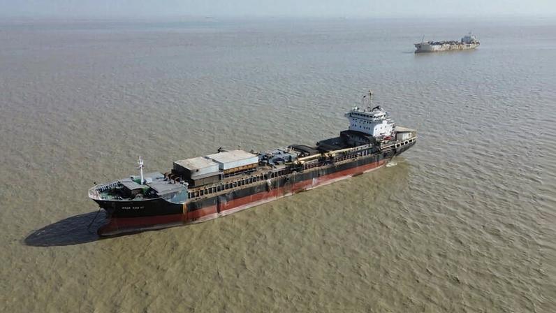 Banner image: Fish meal factory ships Hua Xin 17 and Tian Yi He 6 anchored on the Geba River near the capital of Bissau. Image by Josef Skrdlik for Mongabay.