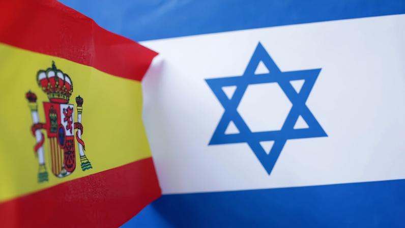 Spanish and Israeli flags are seen in this illustration taken June 23, 2025. REUTERS/Dado Ruvic/Illustration