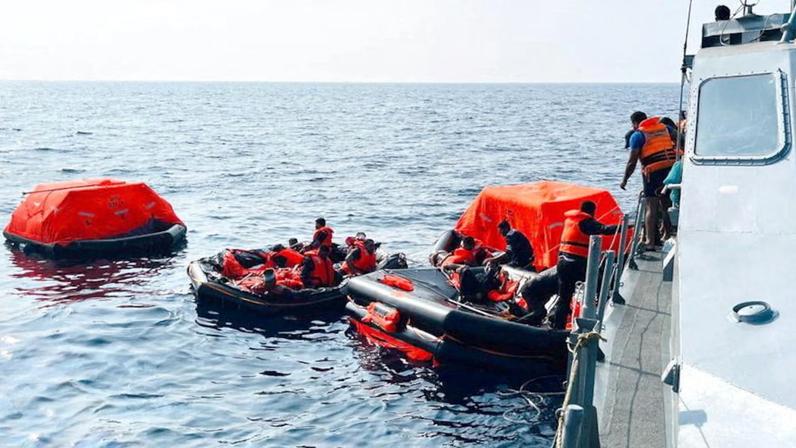 Sri Lanka Navy personnel assist Iranian sailors during a rescue operation after responding to a distress call from their vessel, the Iranian military ship, IRIS Dena, while at sea within Sri Lanka’s maritime search and rescue region, in Indian Ocean, Sri Lanka, March 4, 2026. Sri Lanka Navy/Handout via REUTERS