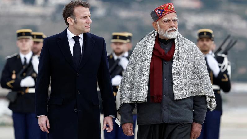 French President Emmanuel Macron and Indian Prime Minister Narendra Modi attend a departure ceremony at Marseille Provence airport in Marignane as part of a visit in Marseille, France, February 12, 2025. REUTERS/Christian Hartmann/Pool/ File Photo