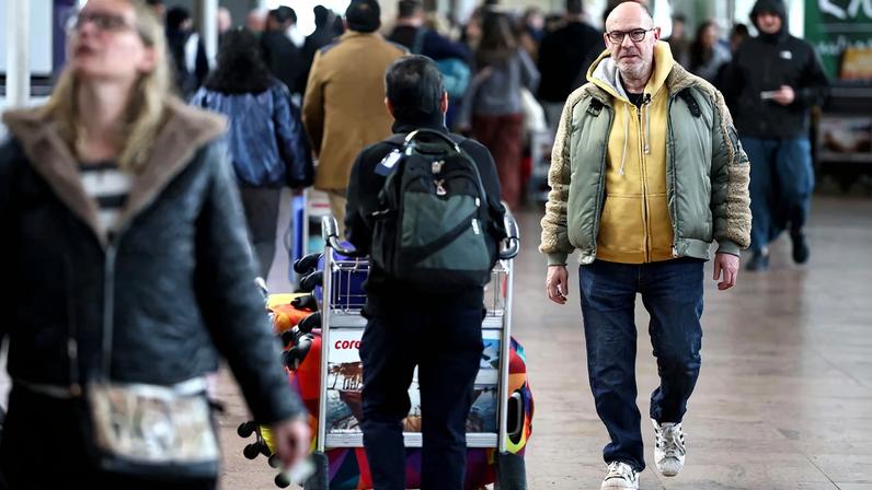 Belgian Walter Benjamin, who lost a leg in the March 22, 2016 suicide bomb attack at Brussels Airport, walks in the departures terminal as Belgium prepares to mark the 10th anniversary of the attack, at Brussels Airport in Zaventem, Belgium, March 10, 2026.