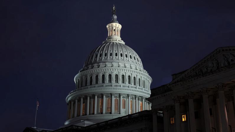 A view of the U.S. Capitol building at night in Washington