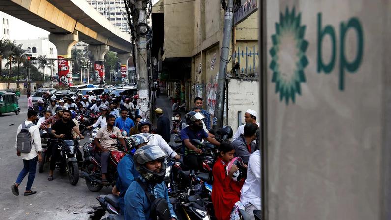 Vehicles queue at a fuel station, as concerns grow over fuel supplies following U.S.-Israel conflict with Iran, in Dhaka