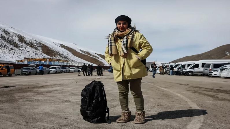 Leila, 45, from Shiraz, Iran, poses for a portrait ahead of crossing from Turkey into Iran, in Van province, Turkey, March 6, 2026. Leila had been staying in Istanbul, where she occasionally assists academics connected with a German historical research institution. But after losing contact with her family in Shiraz, she decided she had to return home.