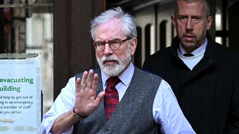 Former Sinn Fein president Gerry Adams walks outside the High Court, in London
