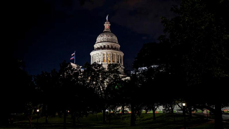 The Texas Capitol is lit during a session in the State Senate, as Republicans attempt to pass an HB 4, a bill that would redraw the state's 38 Congressional Districts, in Austin, Texas, U.S. August 22, 2025. REUTERS/Sergio Flores