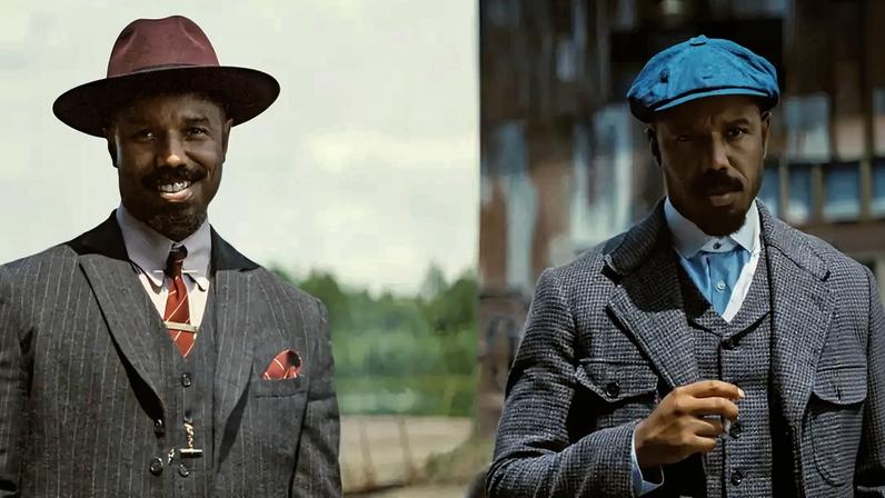 Imagem de dois homens usando terno e chapéu.