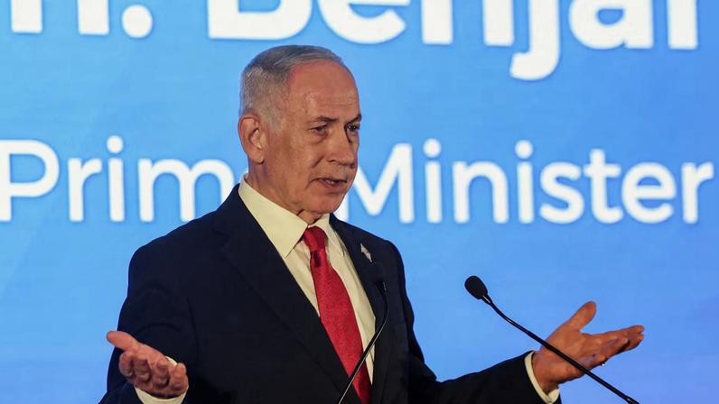 Israeli Prime Minister Benjamin Netanyahu gestures as he speaks during the Conference of Presidents of Major American Jewish Organisations, in Jerusalem, February 15, 2026. REUTERS/Ronen Zvulun