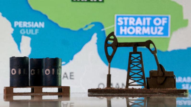 3D-printed oil barrels, an oil pump jack and a map showing the Strait of Hormuz and Iran appear in this illustration taken March 2, 2026. REUTERS/Dado Ruvic/Illustration