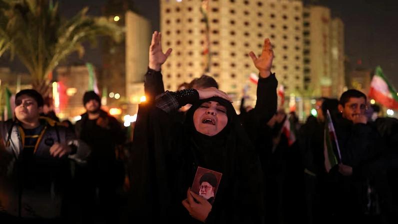 Gathering at the Vali-Asr Square, after Iran's Supreme Leader Ayatollah Ali Khamenei was killed in Israeli and U.S. strikes on Saturday, in Tehran