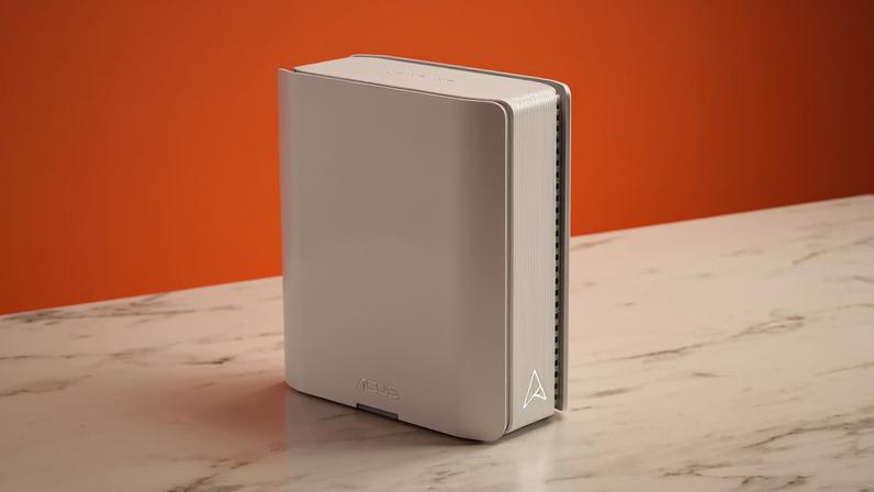 Detail of an Asus ZenWiFi BT8 router for triband WiFi 7 photographed on an orange background.