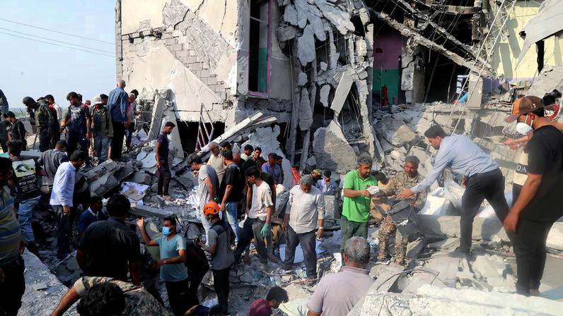 People and rescue forces work following an Israel strike on a school in Minab, Iran, February 28, 2026. Abbas Zakeri/Mehr News/WANA (West Asia News Agency) via REUTERS