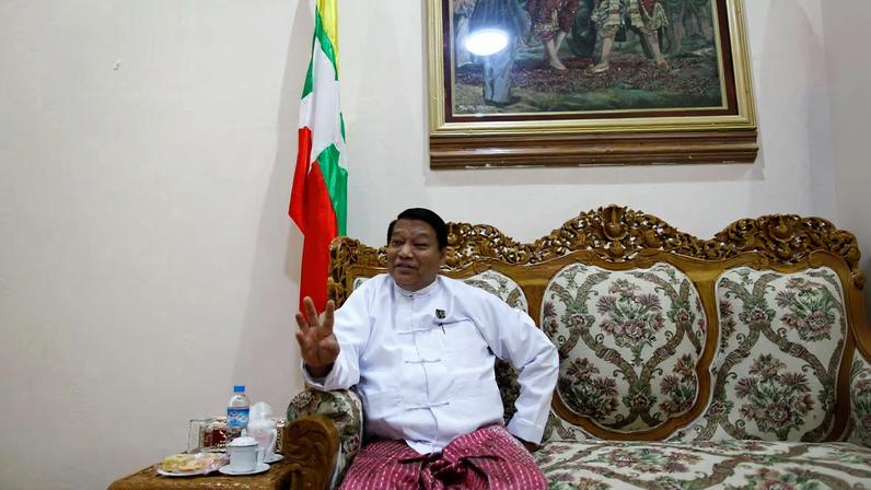 Myanmar's Minister of Immigration and Population Khin Yi talks during an Reuters interview at his office in Naypyitaw June 10, 2013. Picture taken June 10, 2013. REUTERS/Soe Zeya Tun/File Photo