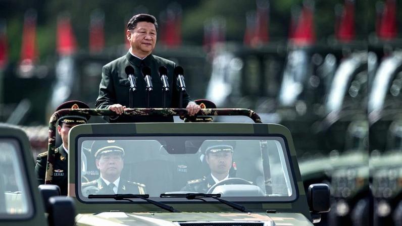 Chinese President Xi Jinping inspects People's Liberation Army soldiers at a barracks in Hong Kong on June 30, 2017.