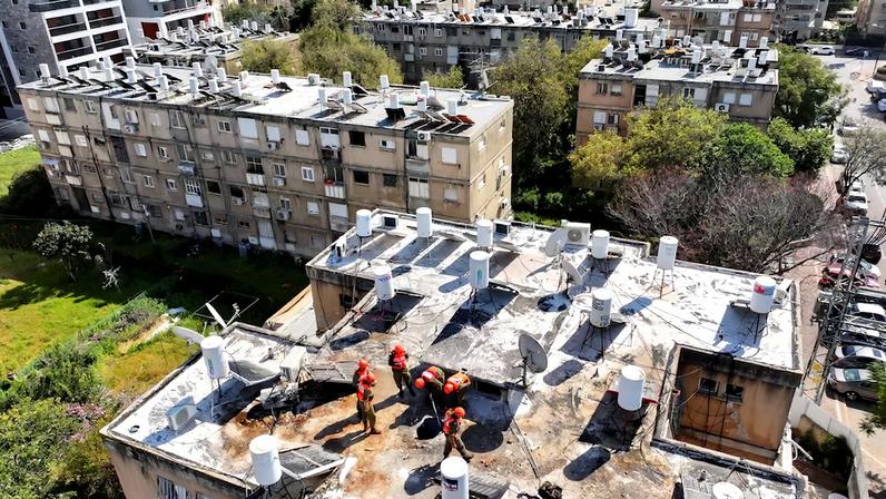 A drone view of site of an Iranian missile strike, amid the U.S.-Israel conflict with Iran, in Petah Tikva