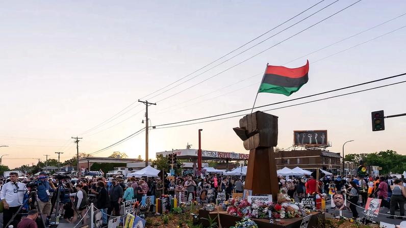 The temporary memorial in the traffic circle at George Perry Floyd Square in Minneapolis as it appeared one year after George Floyd's murder