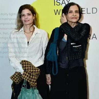 Marina Lima e a esposa, Lídice Xavier, fazem rara aparição pública em exposição