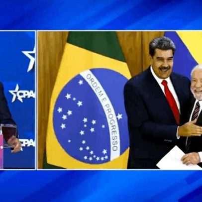 Flávio exibe foto de Maduro abraçado a Lula em evento nos EUA