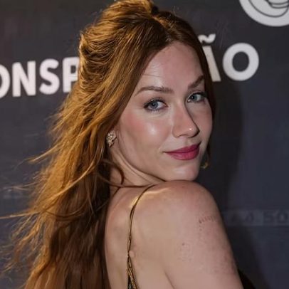 Giovanna Ewbank volta da França e aposta no look dourado para festa do cinema