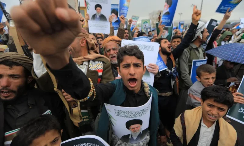 Houthi supporters shout slogans and hold portraits of Iran's slain supreme leader Ayatollah Ali Khamenei during a rally in solidarity with Iran and Lebanon, amid the U.S.-Israeli conflict with Iran, in Sanaa, Yemen, on March 6.