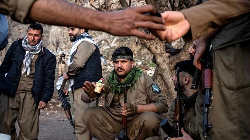 Members of Komala of the Toilers of Kurdistan, a Kurdish Iranian dissident group, gather on March 9, 2026 in Khalifan, Erbil Province, Iraq.