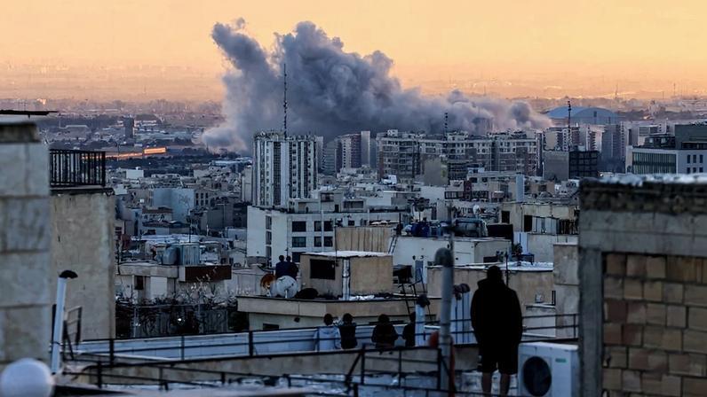 A plume of smoke rises above Tehran following an explosion on March 3. Atta Kenare/AFP via Getty Images