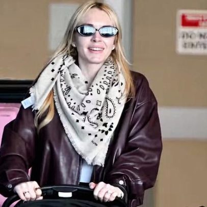 Lindsay Lohan chega a NY com marido e filho em meio a tensões no Oriente Médio