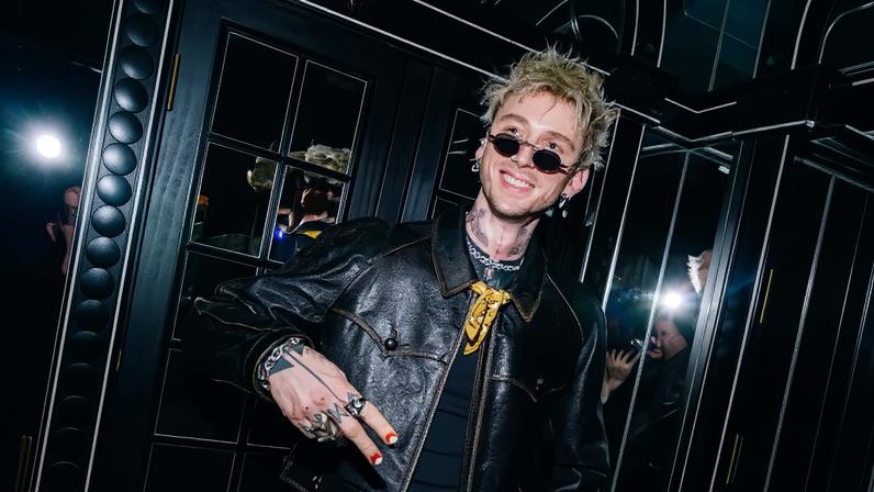 MGK smiles at the Netflix afterparty for the BAFTA Film Awards 2026.