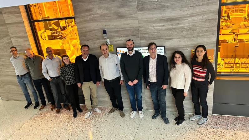 LAB14 GmbH, a corporate network based in Germany that unites eight high-tech companies focused on nanofabrication, microfabrication, and surface analysis, has joined the MIT.nano Consortium. Seen here in front of MIT.nano’s cleanroom are (from left to right): Jorg Scholvin of Fab.Nano, Gregg Moore of Heidelberg Instruments, Christian Bach of Heidelberg Instruments USA, Jenny Rittmaier of LAB14, Martin Wynaendts van Resandt of LAB14, Vladimir Bulović of MIT.nano, Steffen Diez of LAB 14, Niels Wijnaendts van Resandt of LAB14, Anna Osherov of Characterization.nano, and Joyce Wu of MIT.nano.