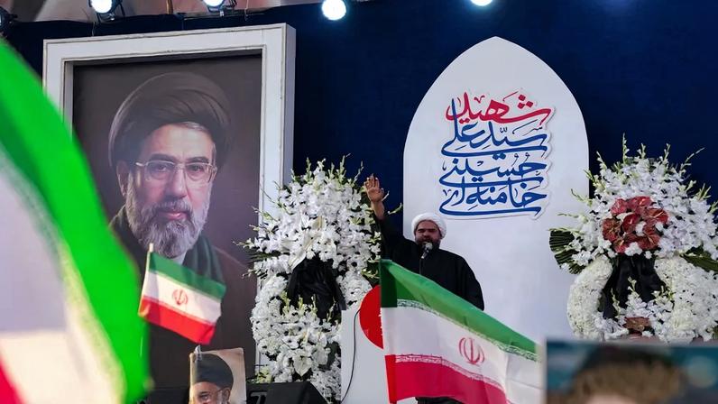 A speaker addresses a rally backing the appointment of Ayatollah Mojtaba Khamenei at Enghelab Square in central Tehran, Iran, on March 9.