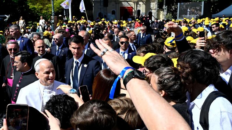 Pope Leo XIV greets youth and catechumens as he leaves the Church of Sainte-Devote in Monte Carlo, Monaco, on March 28, 2026. Pope Leo XIV heads to the Mediterranean principality of Monaco on the French Riviera that is the pontiff's surprise pick for the first western European trip of his papacy. The US-born pope, a former missionary critical of the wealthy elite, will helicopter in for a day in the world's second-smallest state, best known for its casinos, luxury yachts and Michelin-starred dining.