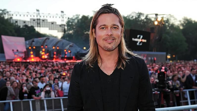 Brad Pitt (seen here in London in June 2013) has his “feminine beauty” to thank for still looking good at 62.