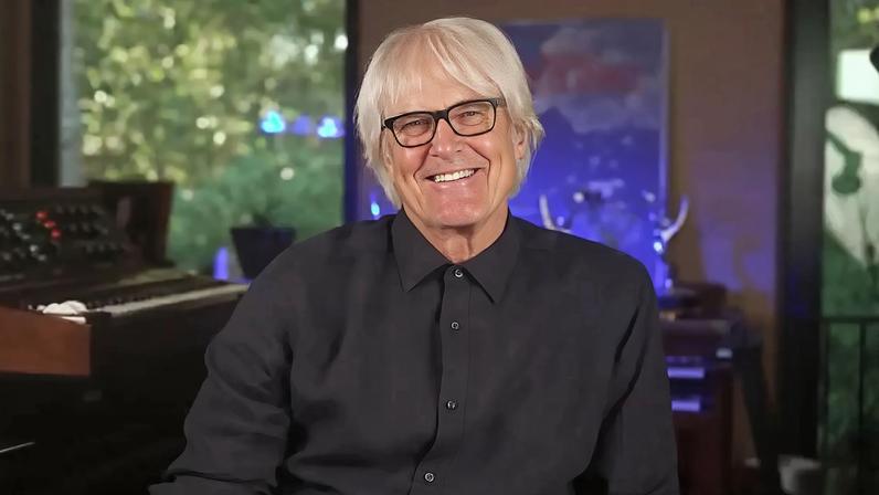 John Tesh, pictured here in his home, dated Oprah Winfrey in the ’70s.