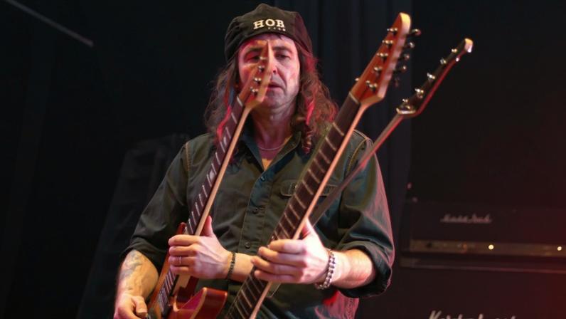 Phil Campbell (seen above performing on stage with Motörhead in 2005) has died at age 64.