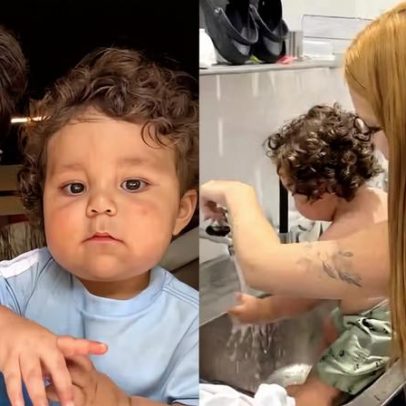 Eliezer celebra o caçula Ravi ao tomar banho raiz de tanque, em vídeo
