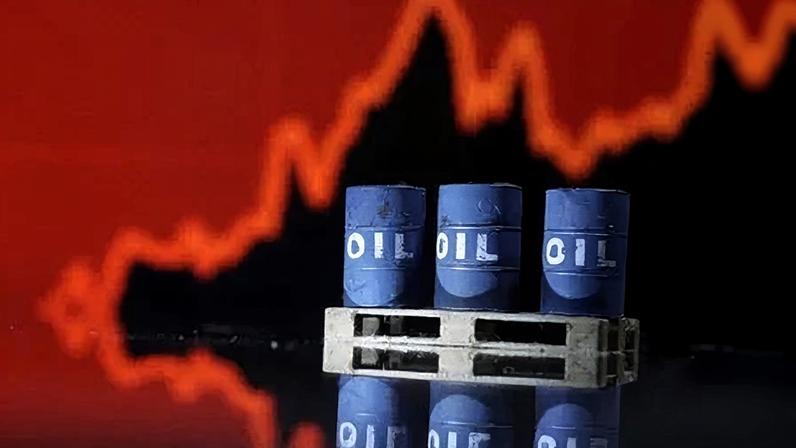 Barris de petróleo em frente a um gráfico de ações