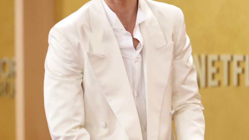 He accessorized with his go-to Cartier necklace.