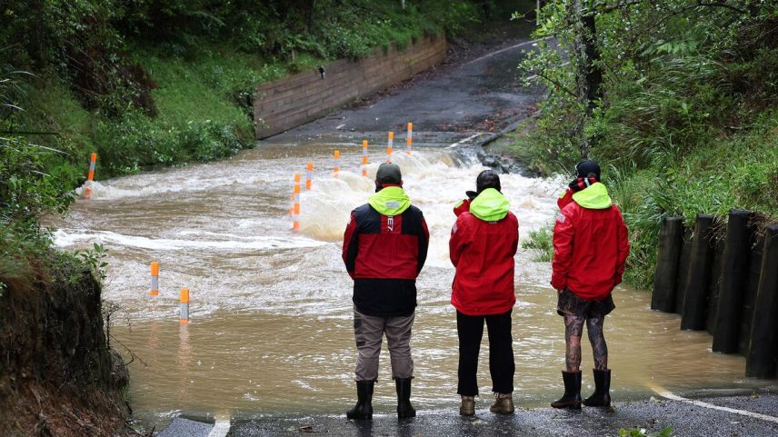 Surf lifeguards monitor the area to help with flood risks in Warkworth, New Zealand, following Cyclone Vaianu on April 12.