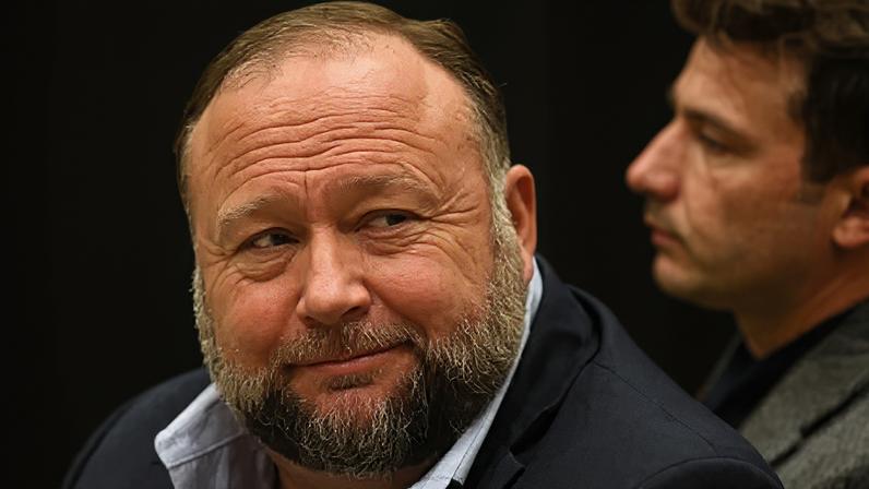 Alex Jones's Infowars platform faces liquidation following a defamation claim by the families of victims of the Sandy Hook shooting