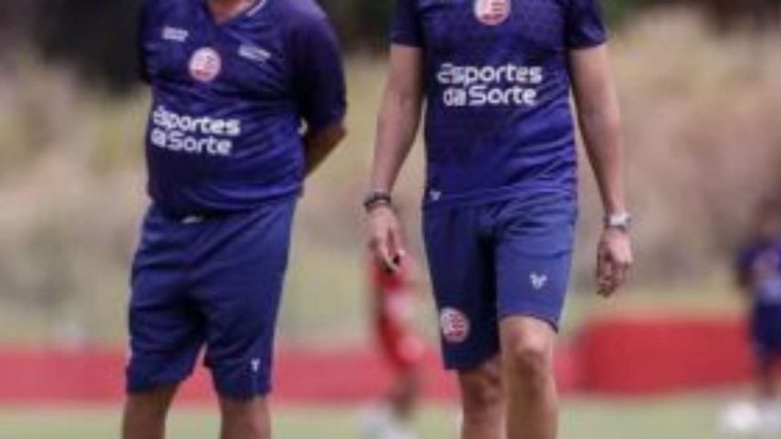Hélio dos Anjos e Guilherme dos Anjos no CT.