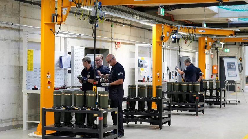 Employees work during a test production run at a newly built artillery ammunition plant by German arms manufacturer Rheinmetall in Unterlüß, 27 August, 2025