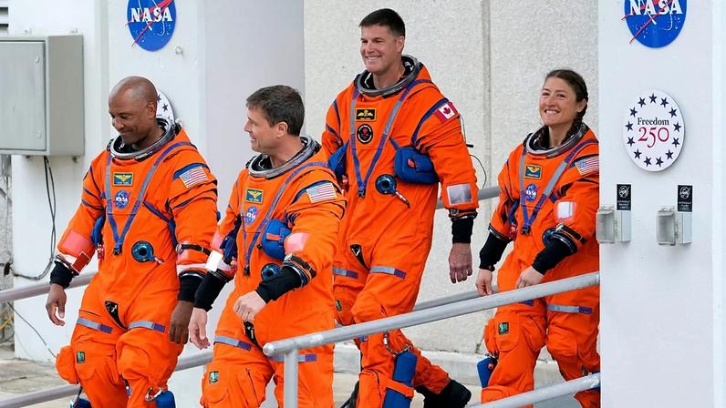 Artemis II astronauts leave the Operations and Checkout Building at the Kennedy Space Center Wednesday, April 1, 2026, in Cape Canaveral, Fla.