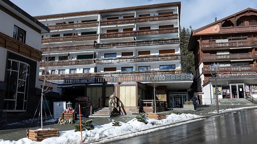 Flowers at the entrance of the "Le Constellation" bar where a fire which broke out during New Year's celebrations in Crans-Montana, 26 January, 2026