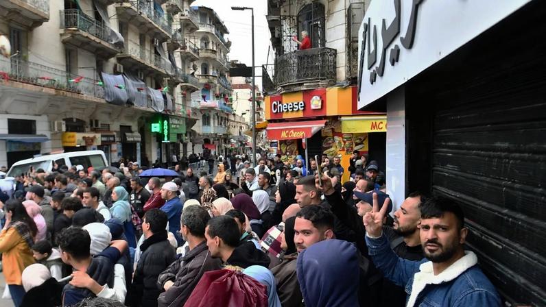 FILE: Algerians gather in downtown Algiers to see Pope Leo XIV, on the first day of an 11-day apostolic journey to Africa during a visit to Algeria, 13 April 2026