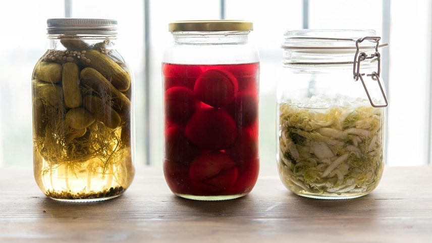 Jars of fermented vegetables, which are believed to support gut health.