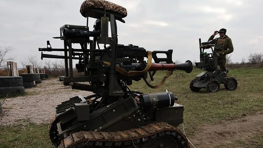 In this photo provided by Ukraine's 65th Mechanized Brigade press service, a soldier tests land drones in Zaporizhzhia region, Ukraine, Saturday, Dec. 6, 2025,