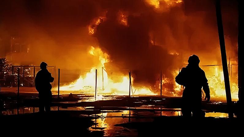 Rescuers work at the site of a Russian missile strike in Kyiv